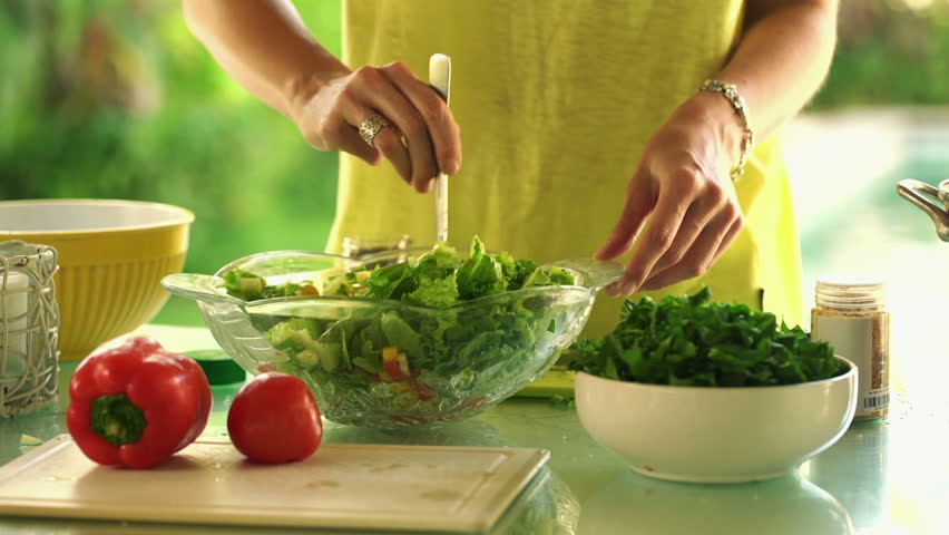 Put into picture. Mix Cooking. Kids to Mix Salad. Woman Mixing Salad. Mix in a Bowl.