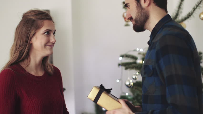 Young Man Giving Gift To Stock Footage Video 100 Royalty Free Young Man Giving Gift To Stock Footage Video 100 Royalty Free 8685376 Shutterstock