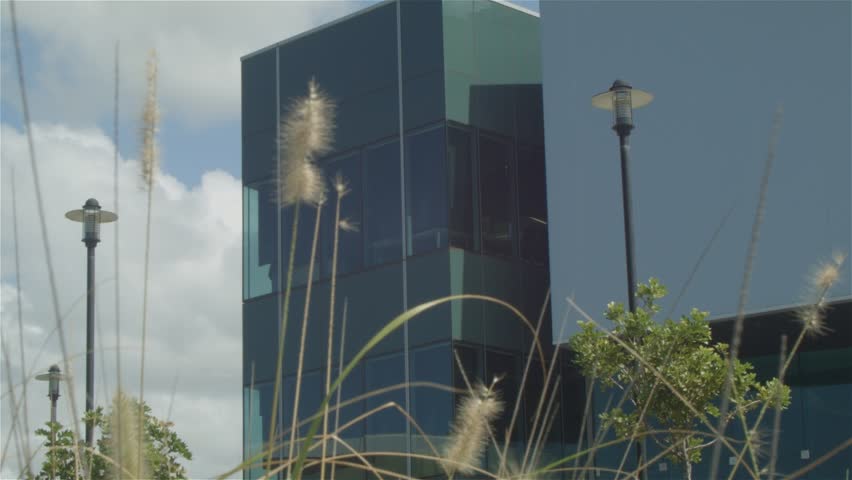 Modern Architecture Videos establishing shot of a modern architecture business building Modern Architecture Videos establishing shot of a modern architecture business building