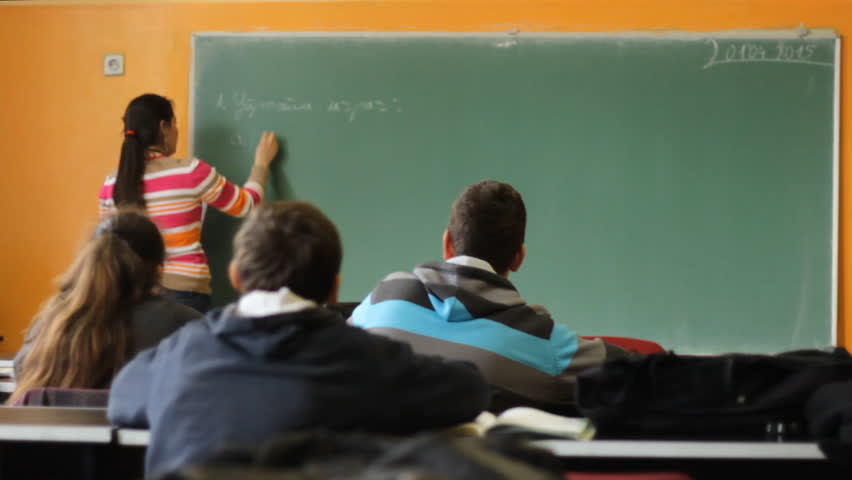Teacher Teaching Math To Her Young Pupils In Clroom Slow Zrenjanin Serbia March 30 2017 Teacher Write On The Table Board Lesson Education