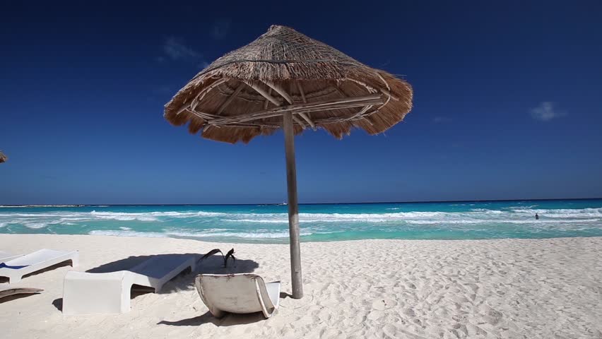 Caribbean Beach With Gr Umbrellas And Wooden Beds Vacation Caribbean Beach With Gr Umbrellas And Wooden Beds Vacation Concept